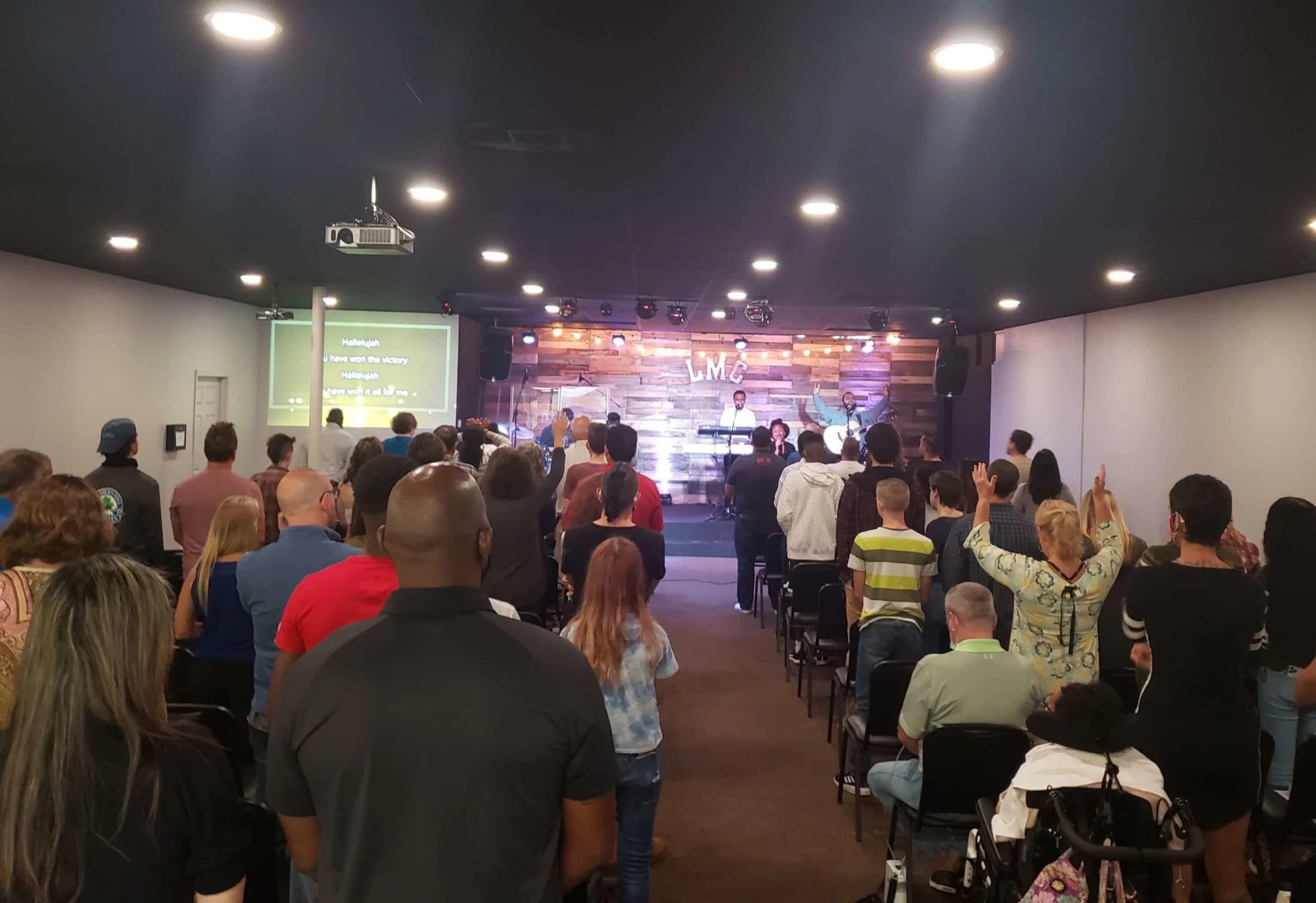 The Living Message Church congregation worshipping together in Clermont, Florida.